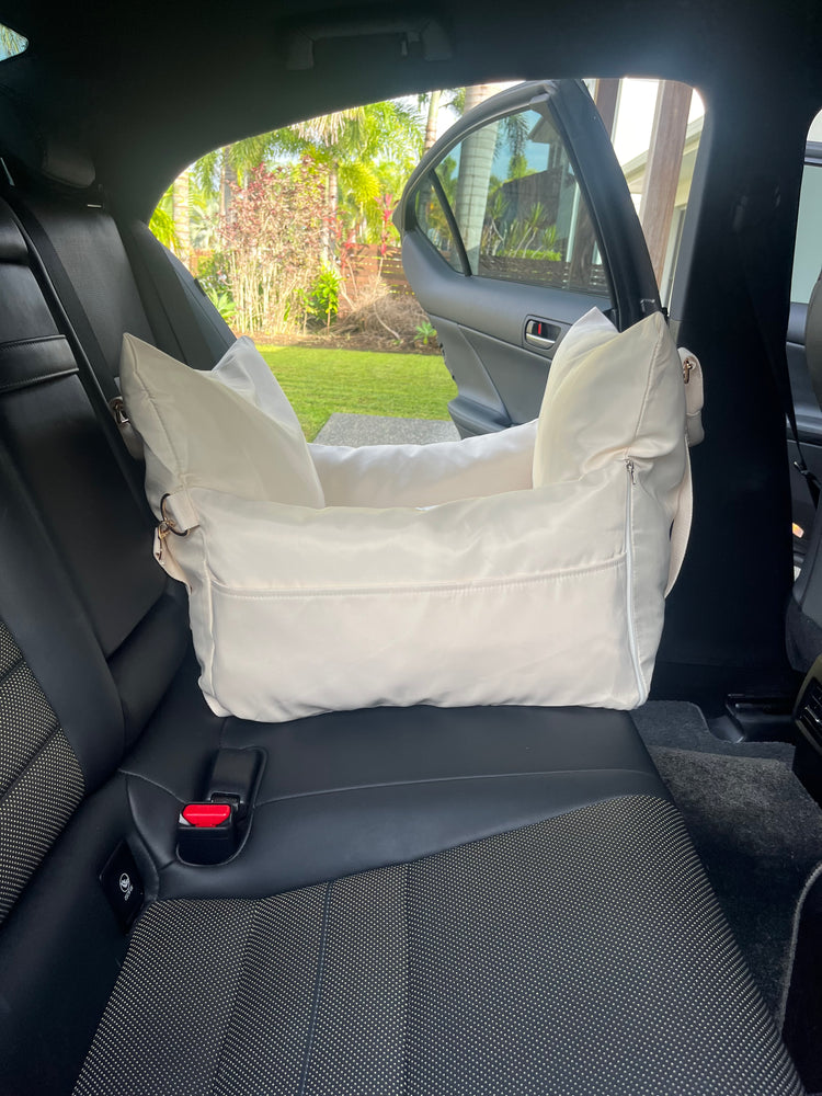 
                  
                    Premium Cream Pet Car Seat
                  
                