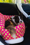 Toffee the Bordie Collie in the Pink donut animals print water resistant dog car seat bed front view in car