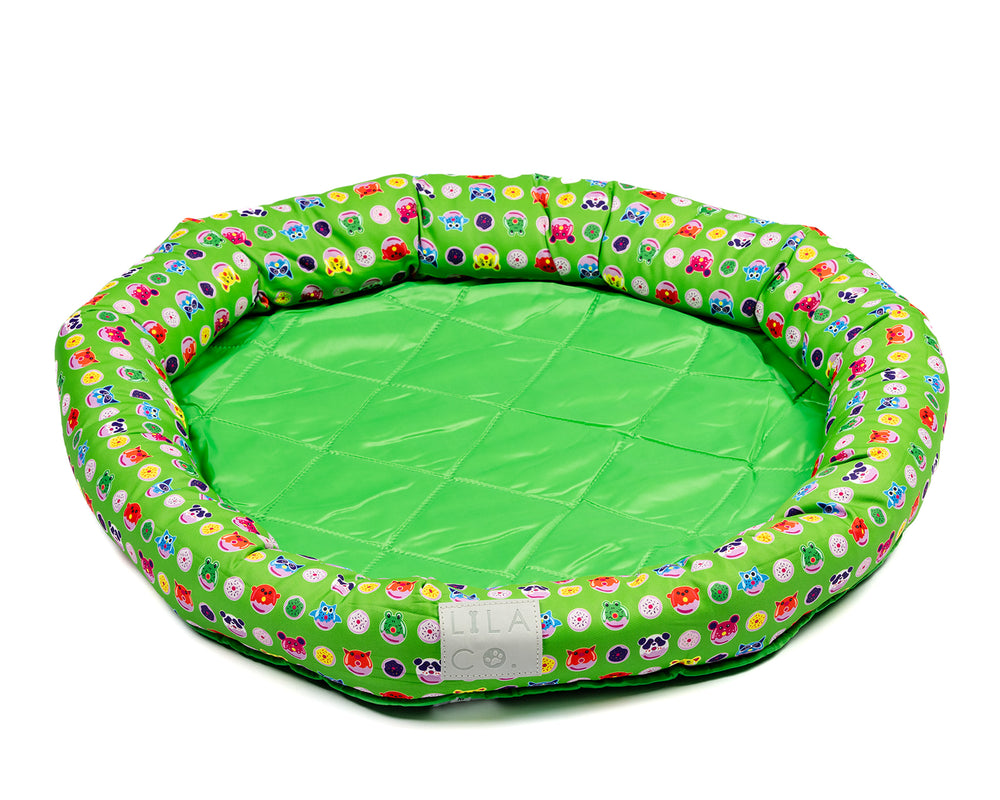 
                  
                    Green donut animals print small, medium and large water resistant cooling dog and pet bed 
                  
                