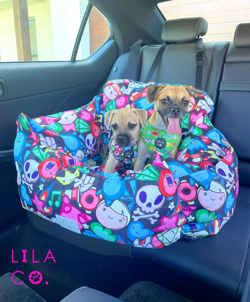 Winter and Chip the Pug x Jack Russell Terriers riding together in black gamer characters print dog car seat bed using double clip extension