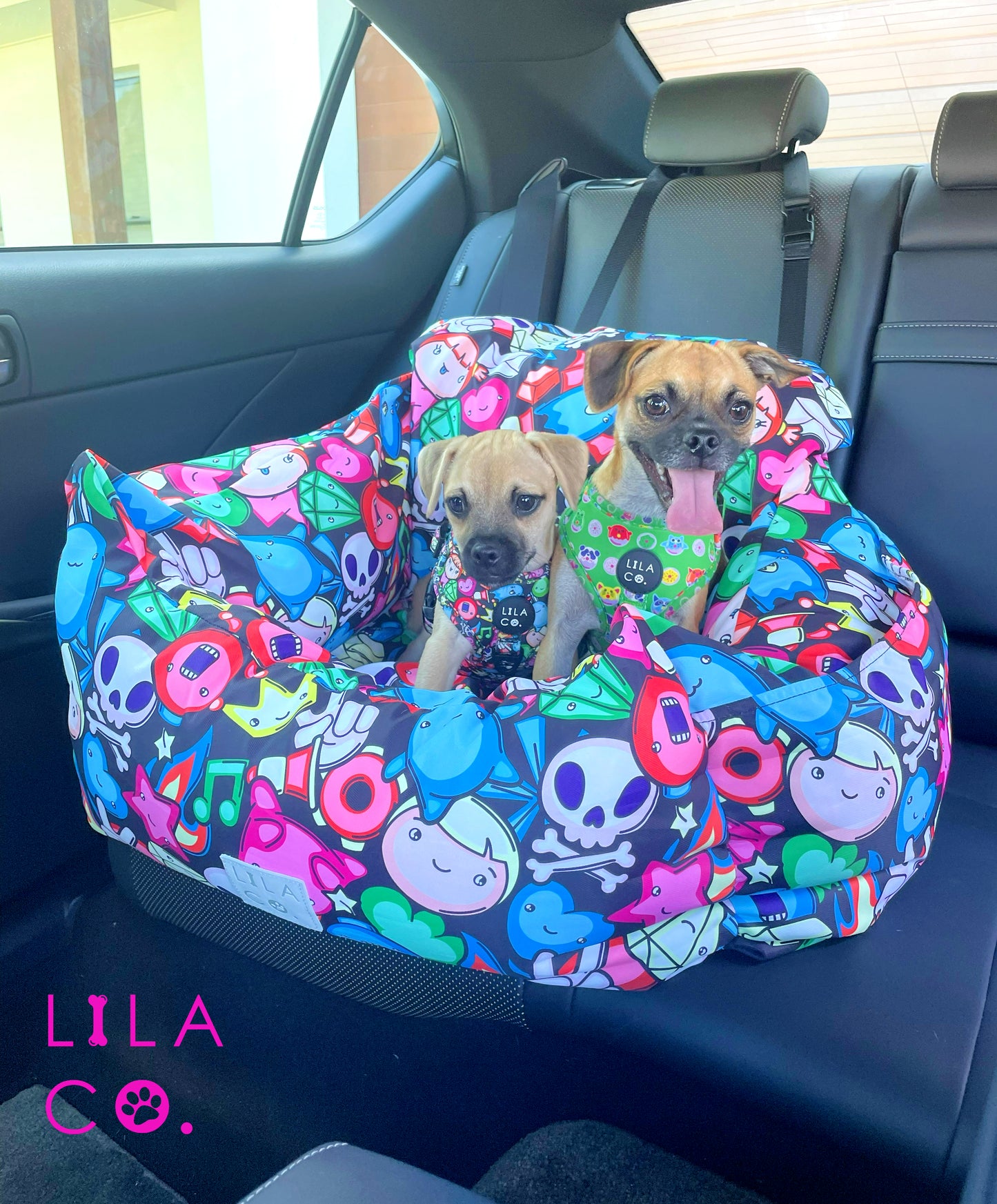 
                  
                    Winter and Chip the Pug x Jack Russell Terriers riding together in black gamer characters print dog car seat bed using double clip extension
                  
                